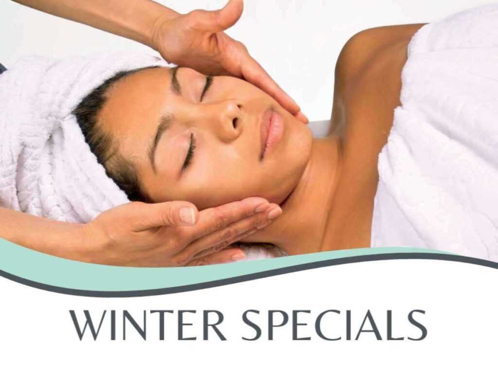 a woman receiving a facial